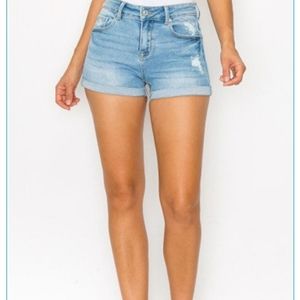 Low rise destroyed light denim shorts